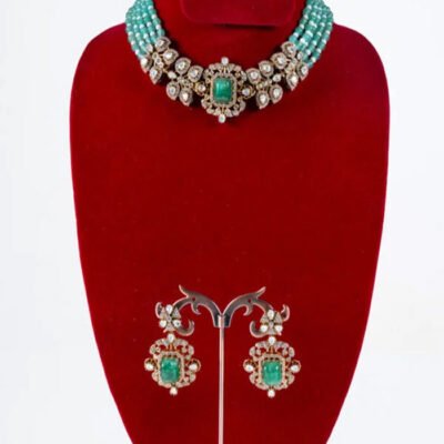 TT1001:27 - Multi-strand Pearl Choker with a Bold Kundan Centrepiece with Earrings.