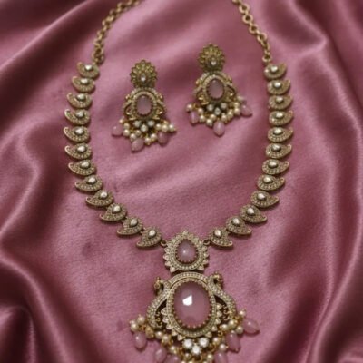 Antique Gold-Tone Kundan Necklace and Earring Set with Pink Drops