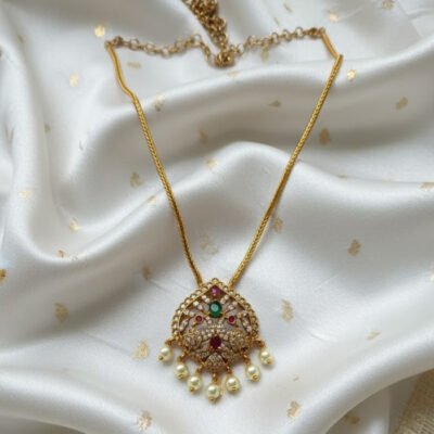Antique Gold-Tone Lakshmi Pendant Necklace with Navratna Accents and Pearl Drops